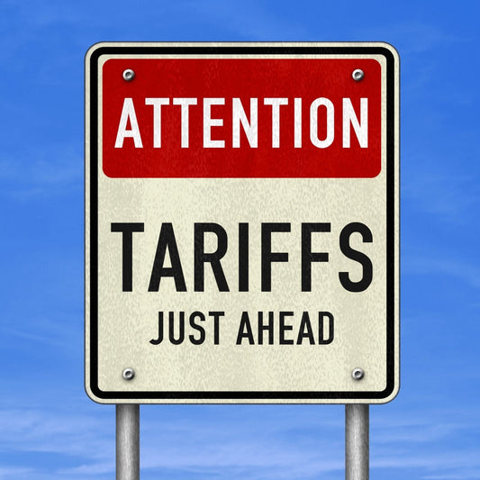 A sign with a slogan saying Tarrifs