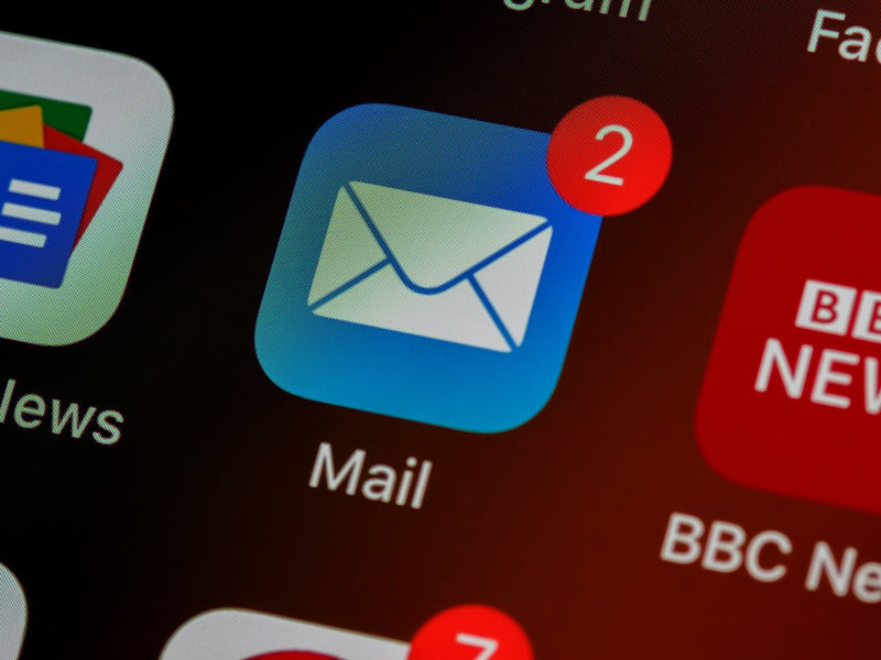 Email app icon with a notification badge on a smartphone screen