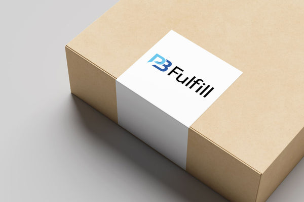 Cardboard box with a white label featuring 'PB Fulfill' logo on a light gray background